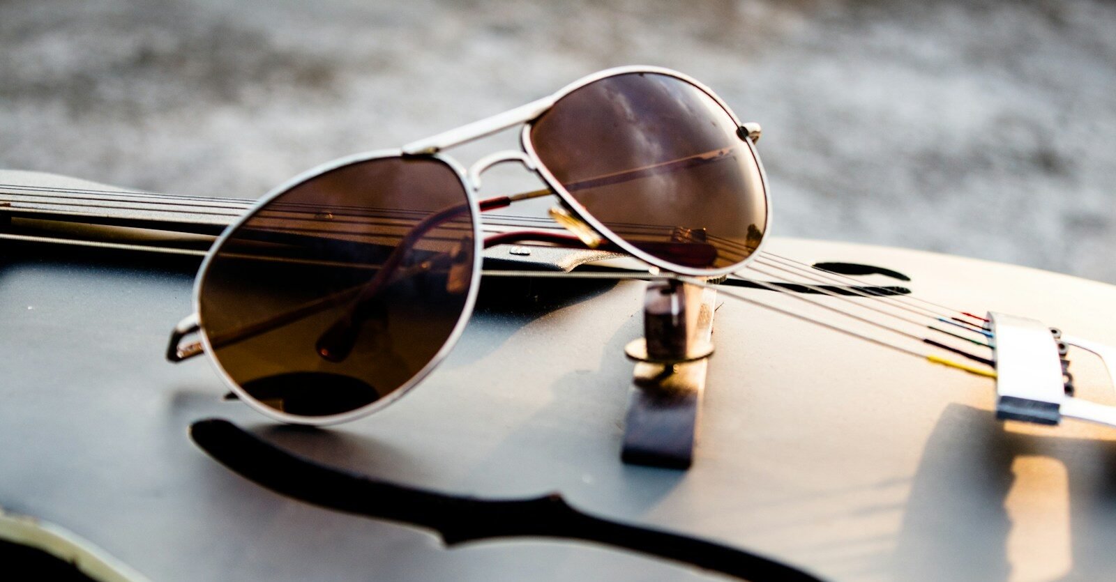brown sunglasses with stainless steel frames